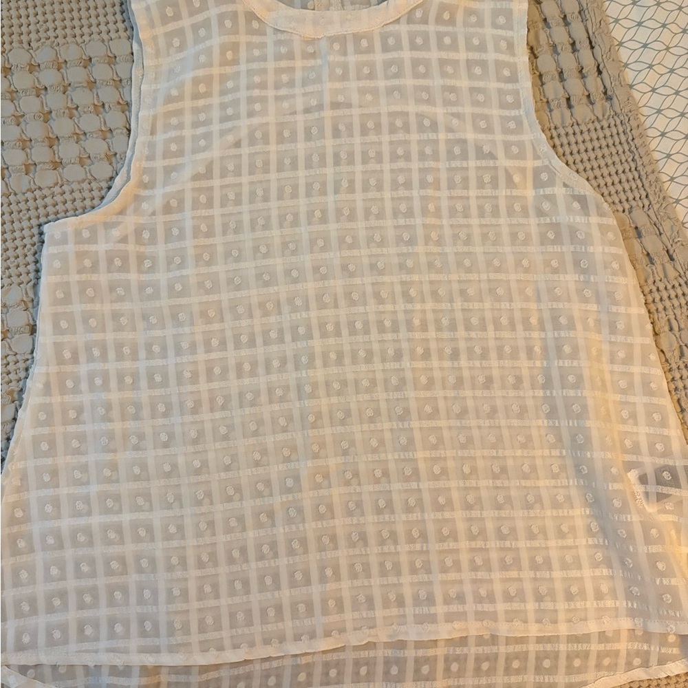 Chic Cream Sleeveless Blouse